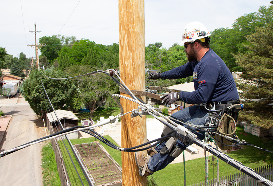 technician on electric pole