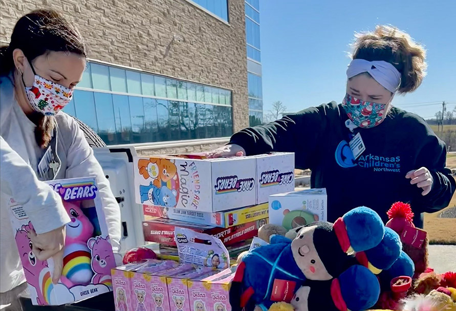 Toys are given to children visiting the hospital 