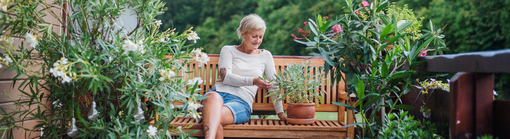Woman on a garden bench
