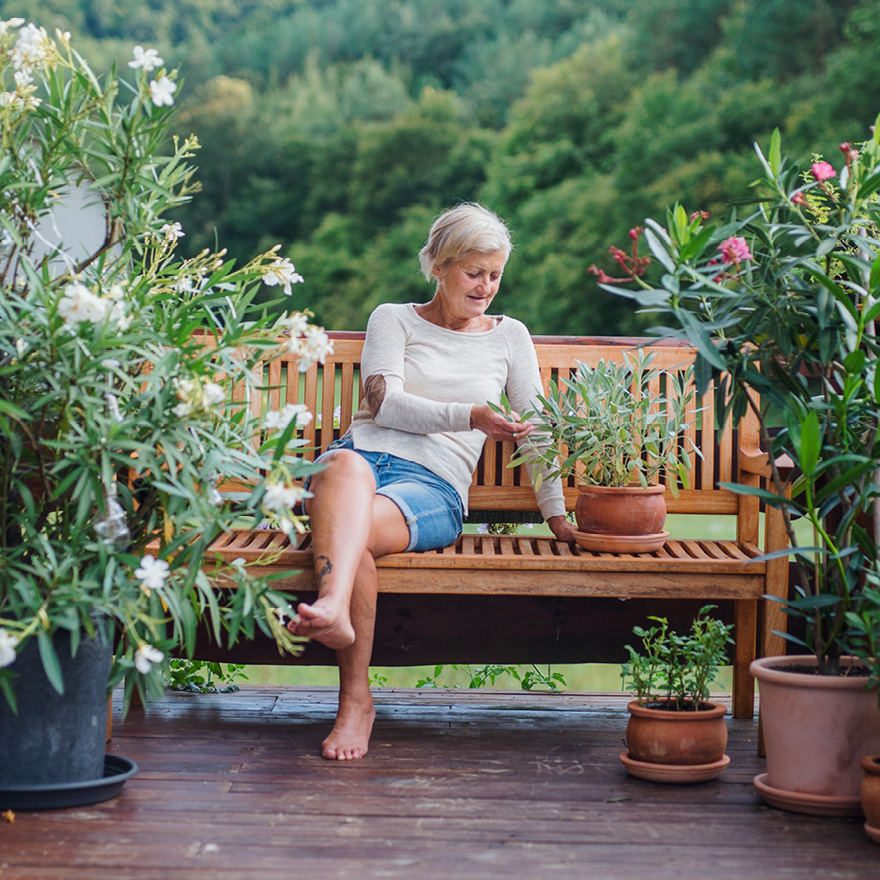 Woman on a garden bench