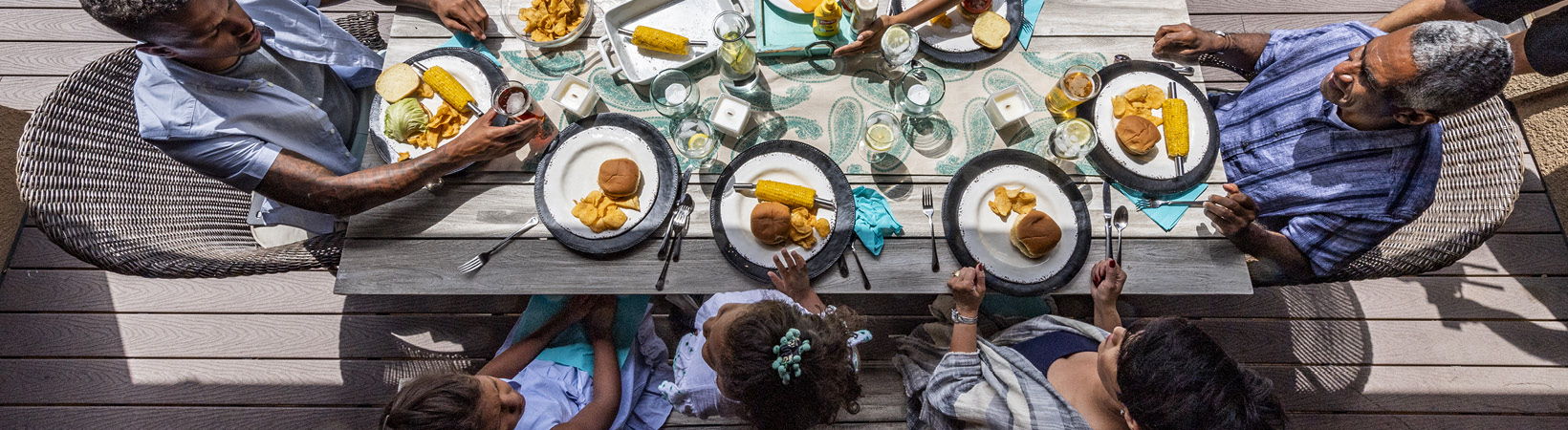 Family eating together outside