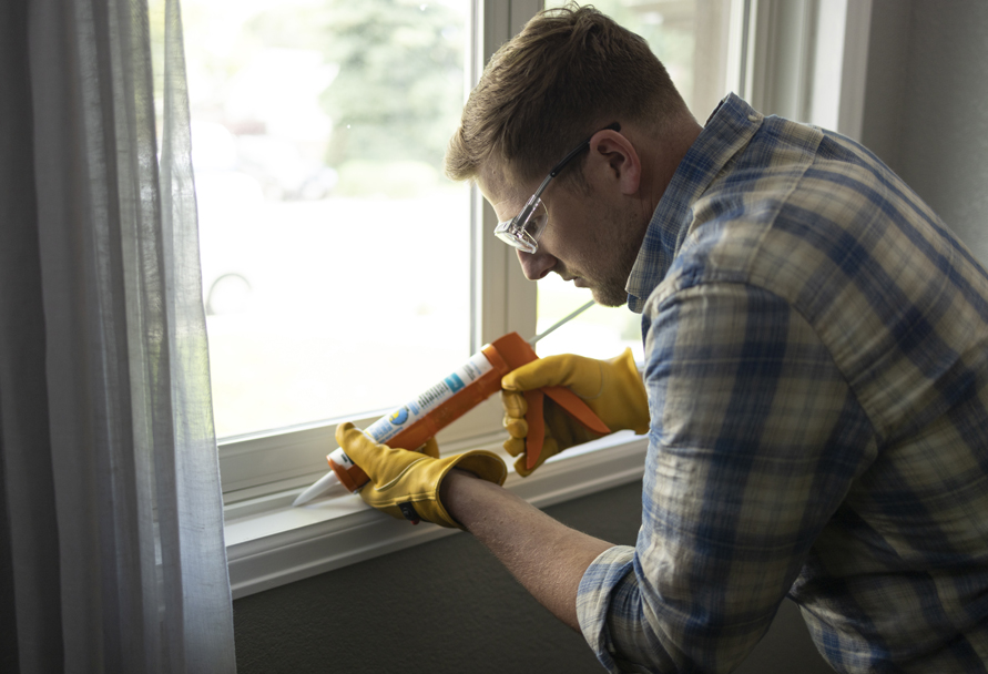 Mike of Team Ready showing you how to caulk a window