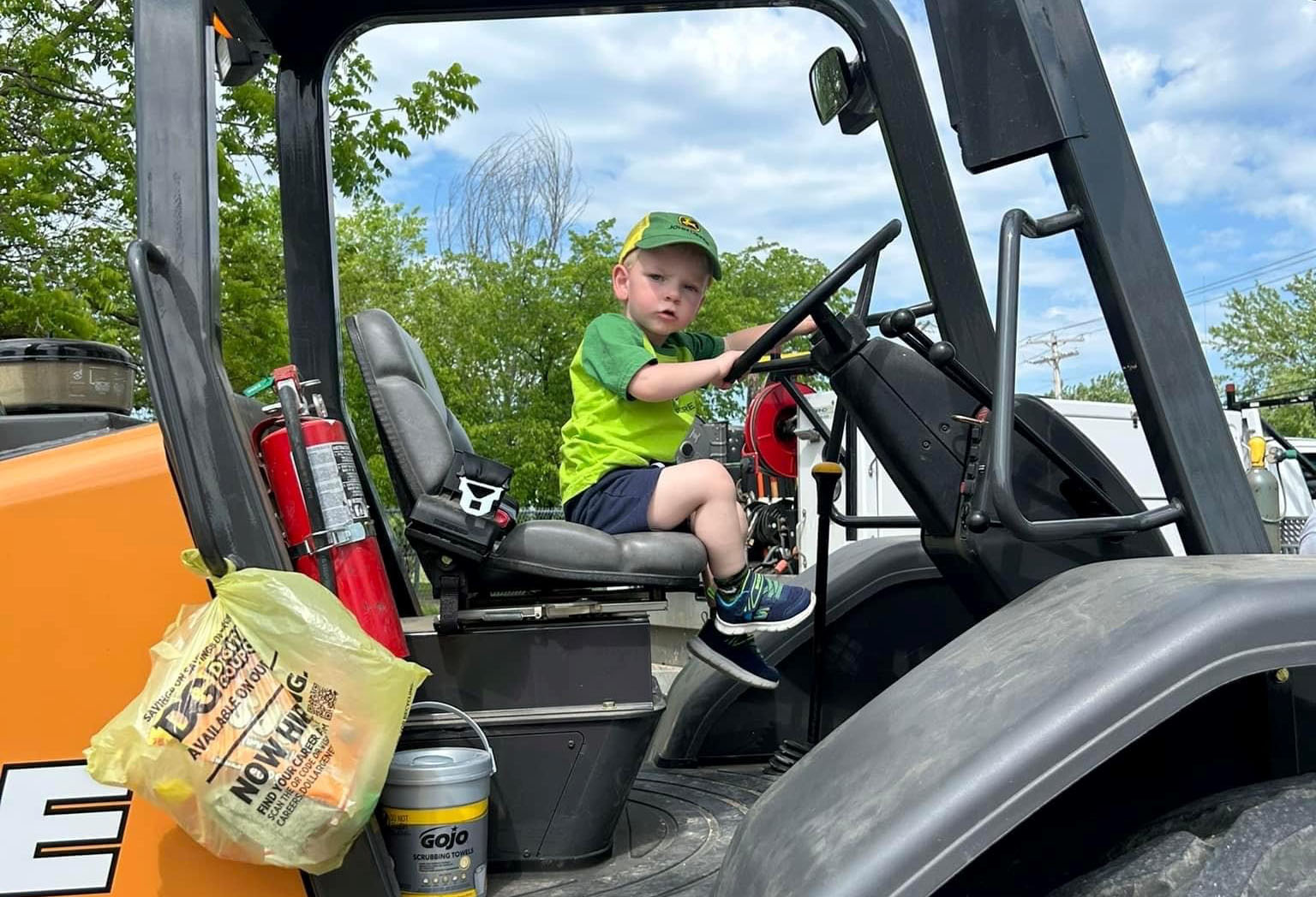 kid in forklift