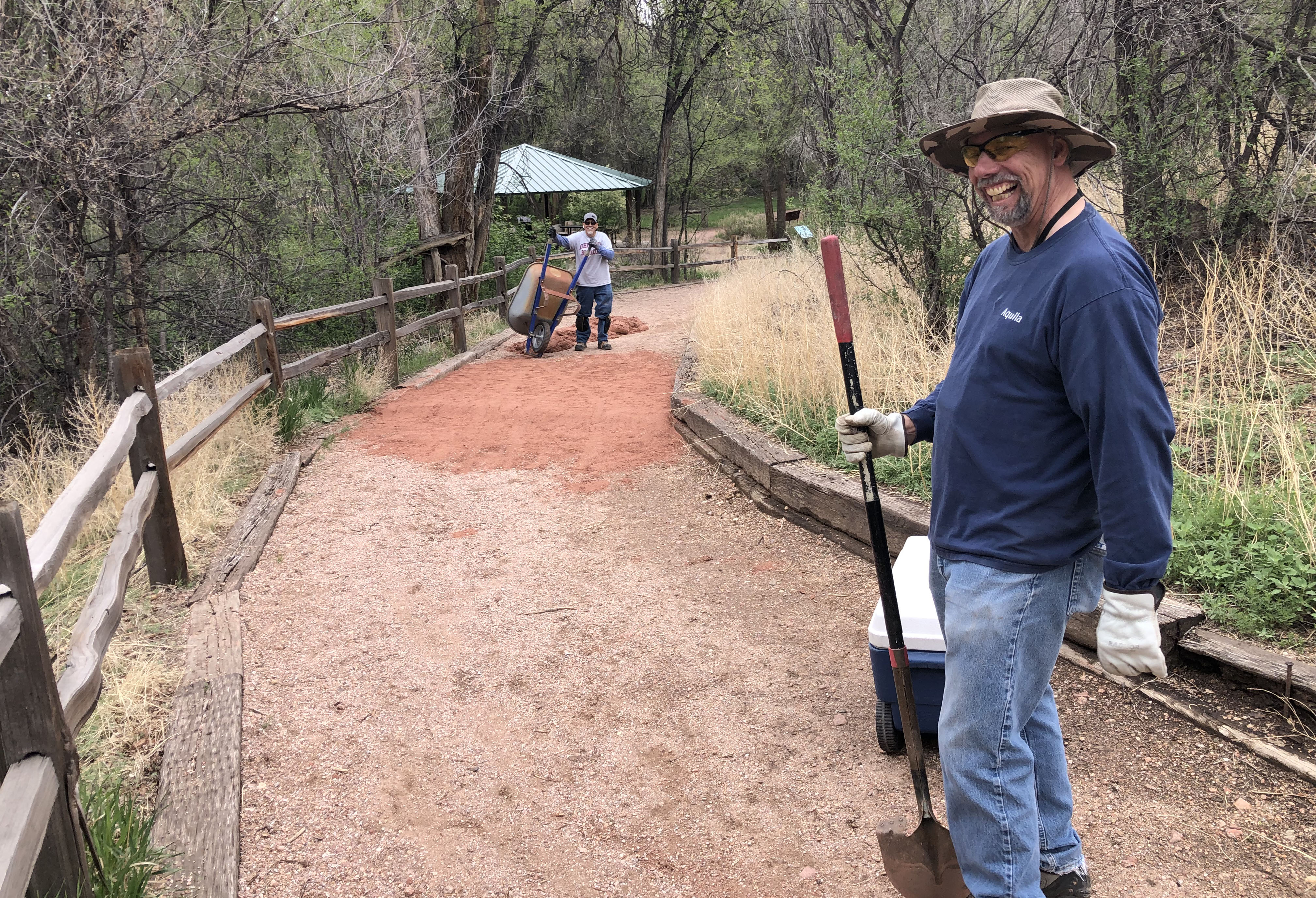 volunteers cleaning up trail