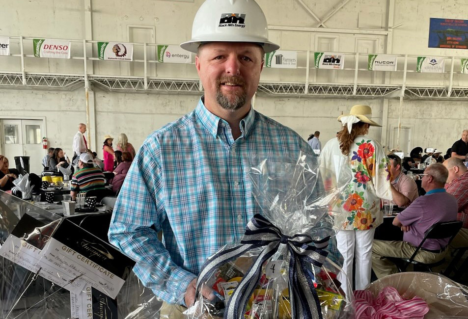 Brian Hollis with donation basket