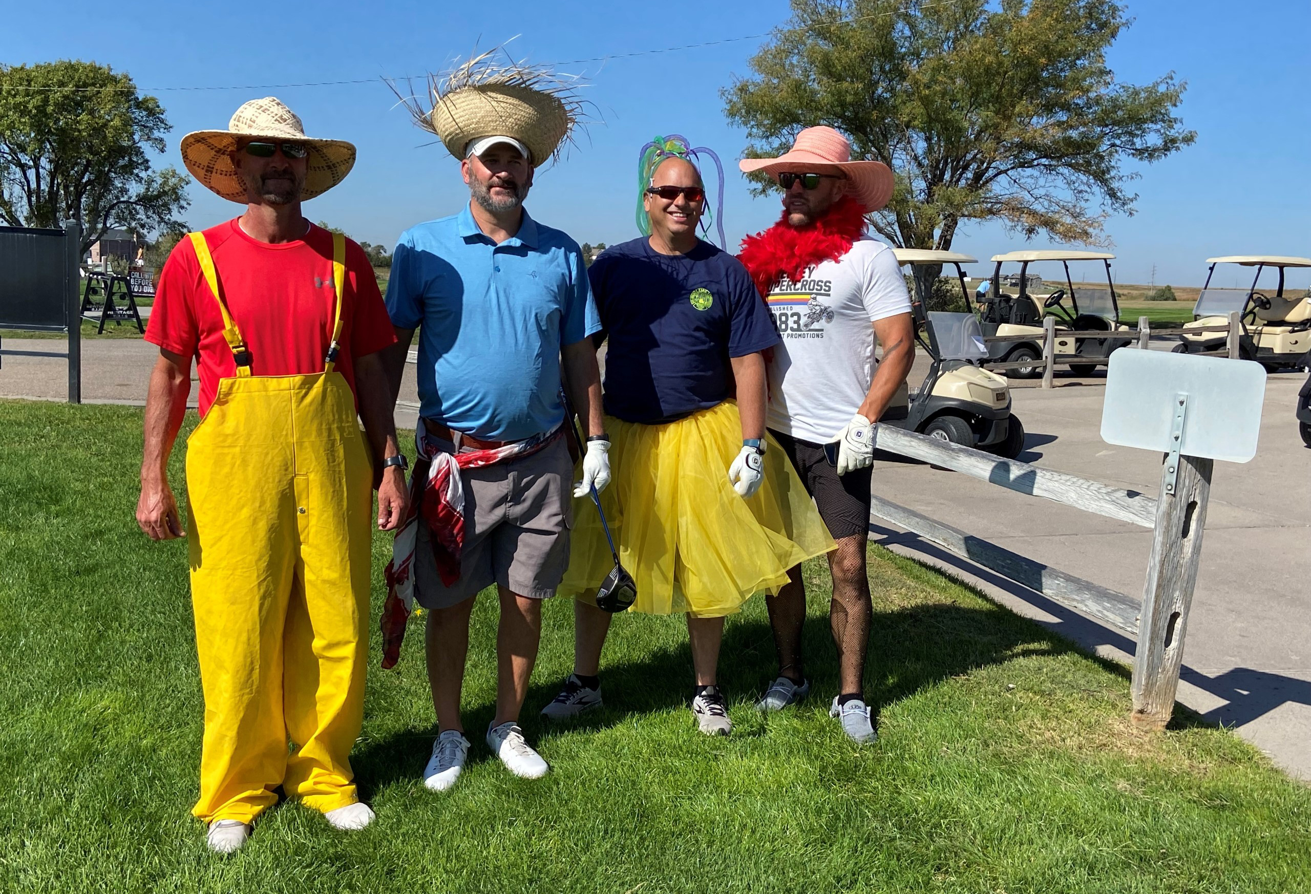 men dressed in costumes at golf tournament
