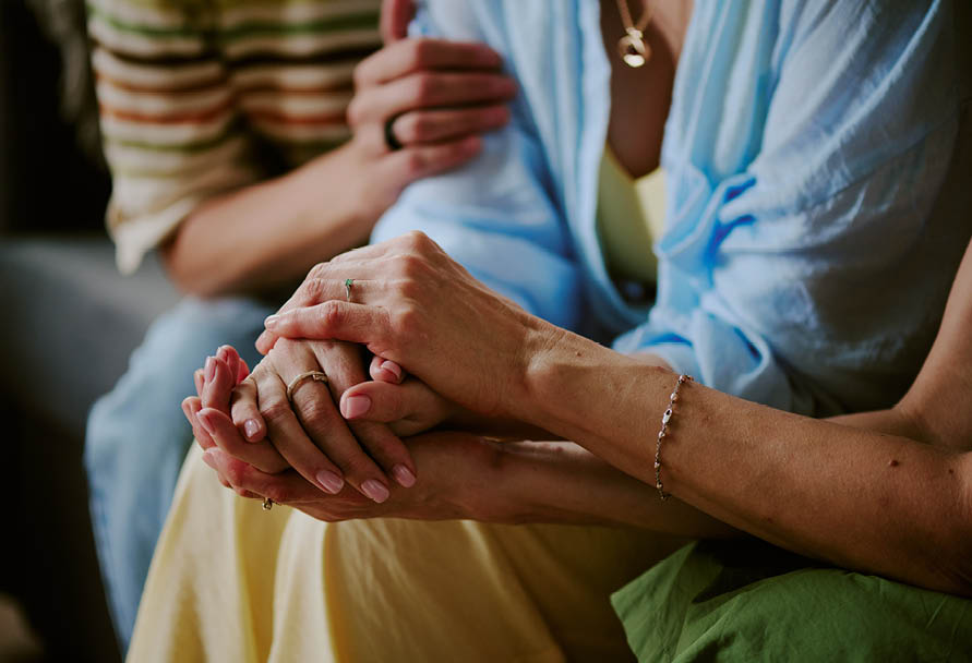 Close up of holding hands