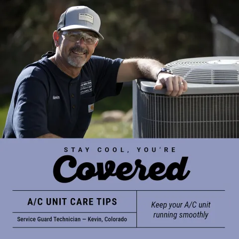 Appliance technician with an air conditioner unit